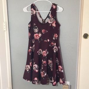A short burgundy dress